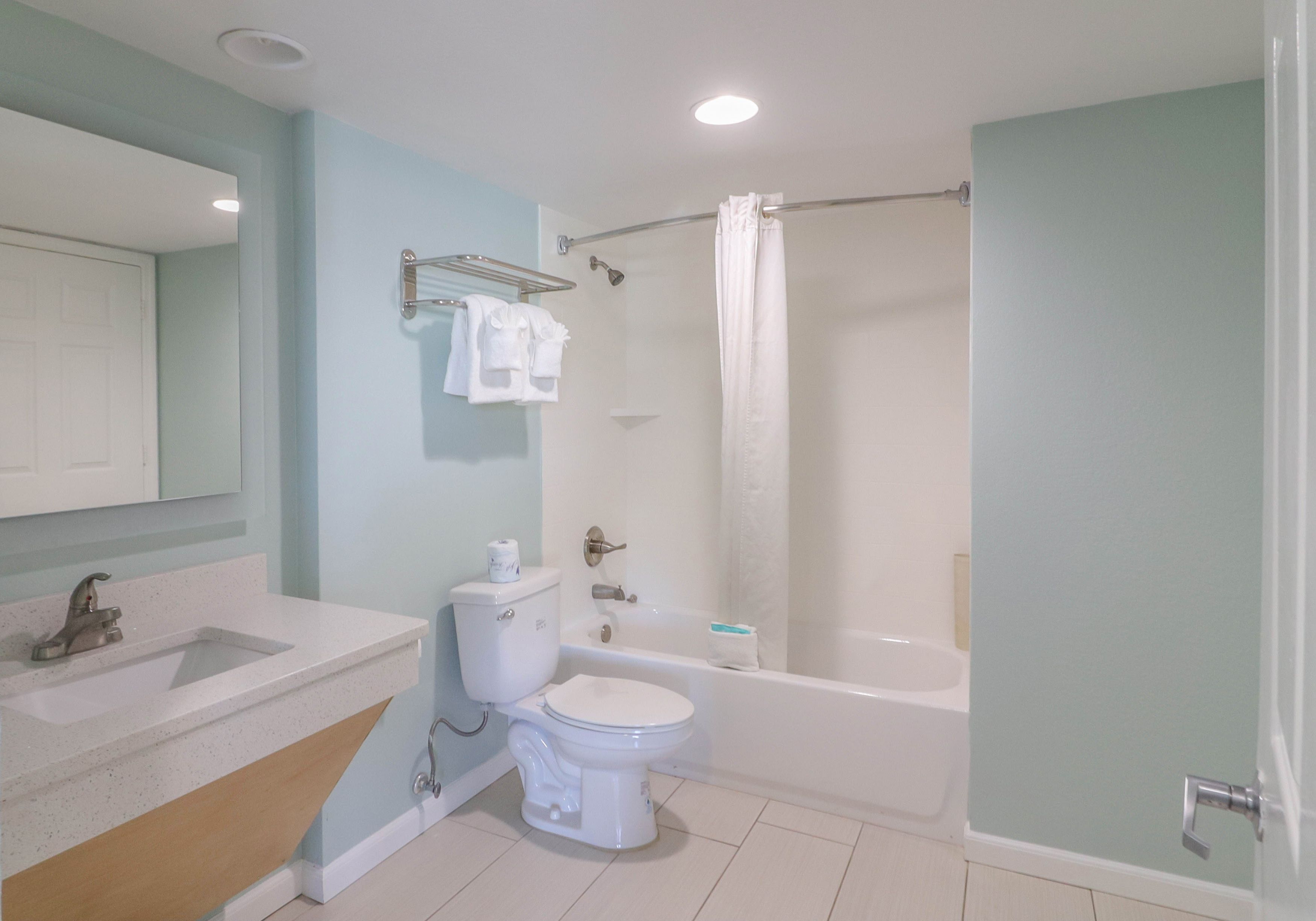 Standard Suite, 2 Queen Beds | Bathroom | Combined shower/bathtub, free toiletries, hair dryer, towels