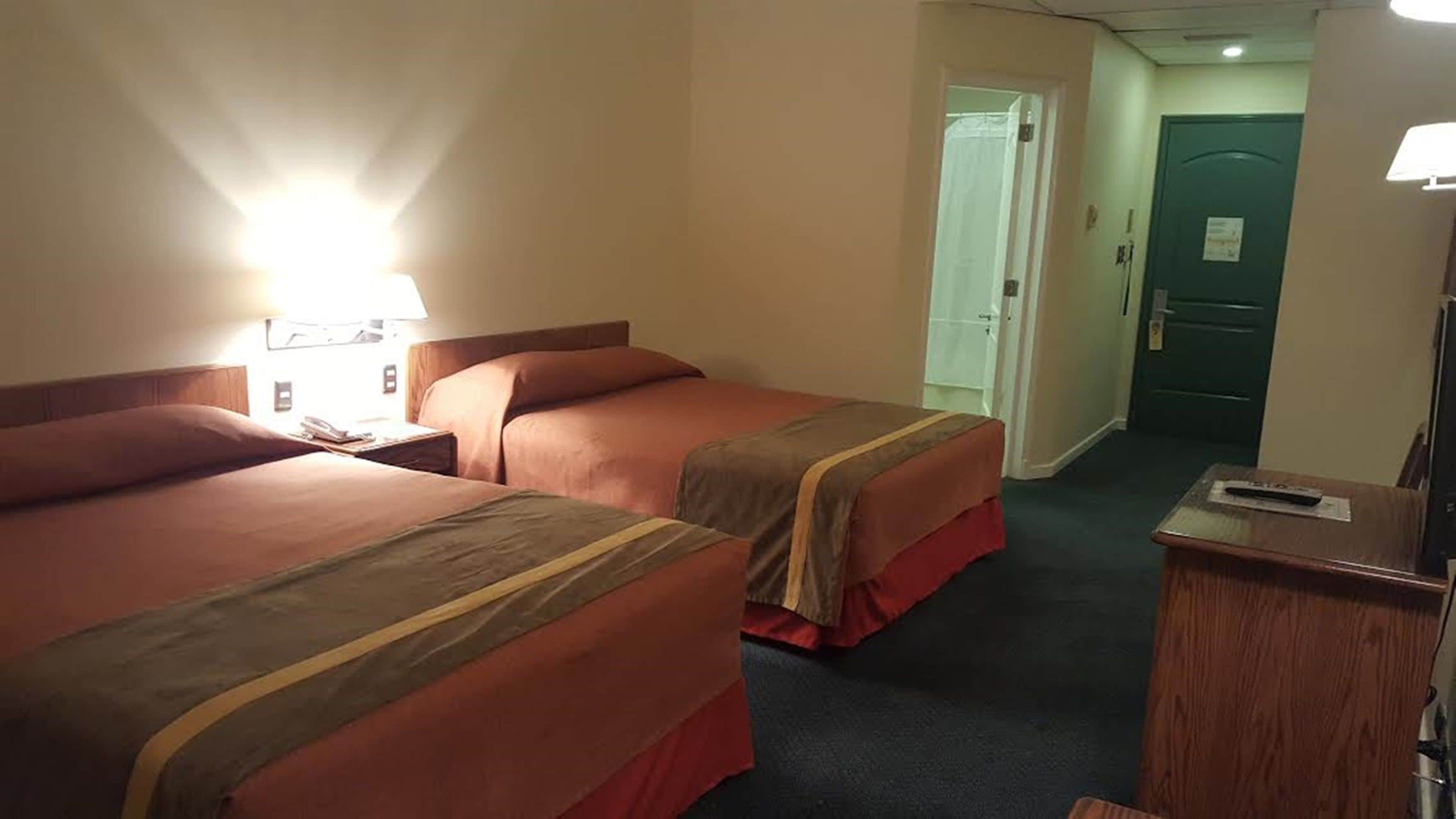 double room, 2 double beds | minibar, in-room safe, desk, soundproofing