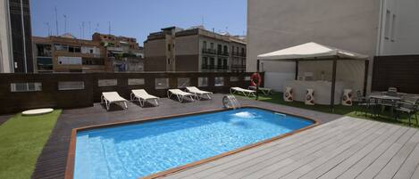 Outdoor pool, open 10:00 AM to 8:00 PM, sun loungers