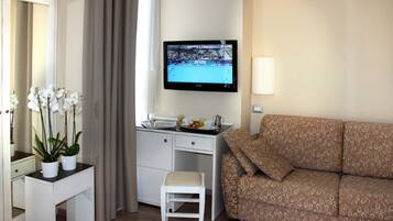Superior Double Room | Minibar, in-room safe, desk, blackout drapes