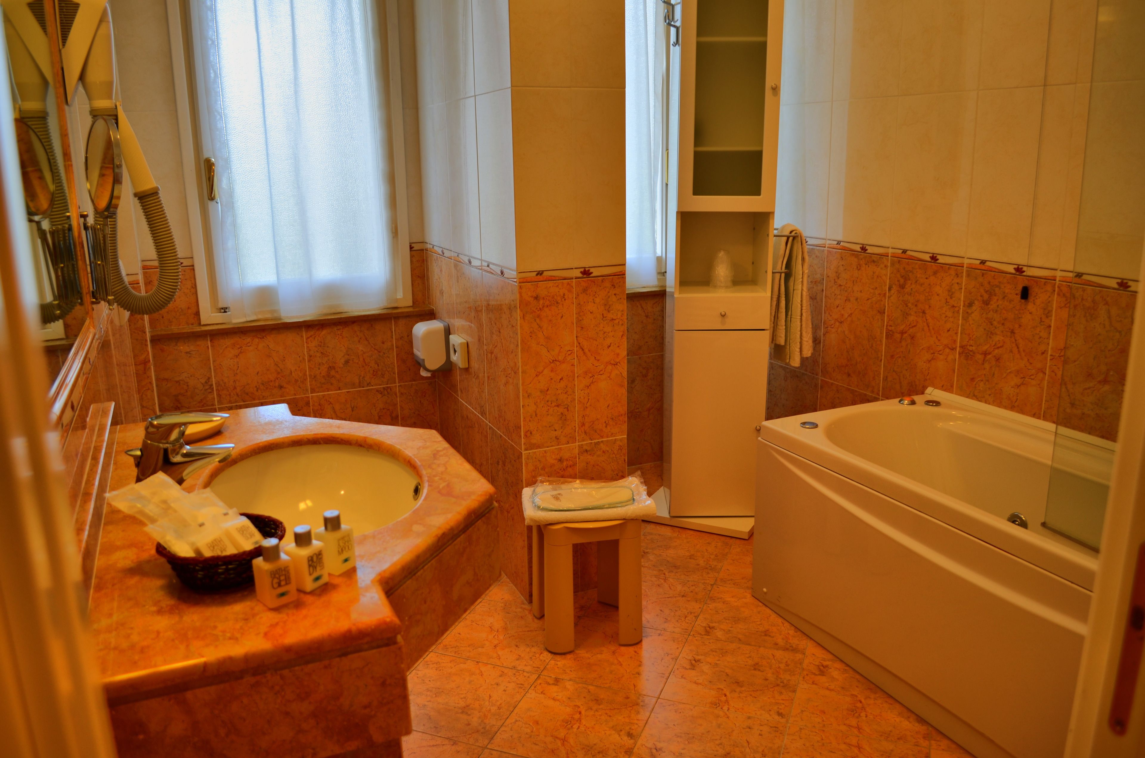 free toiletries, hair dryer, bidet, towels