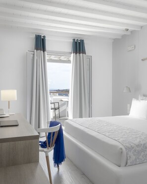Divine Double, Sea/Pool View | Minibar, in-room safe, desk, soundproofing