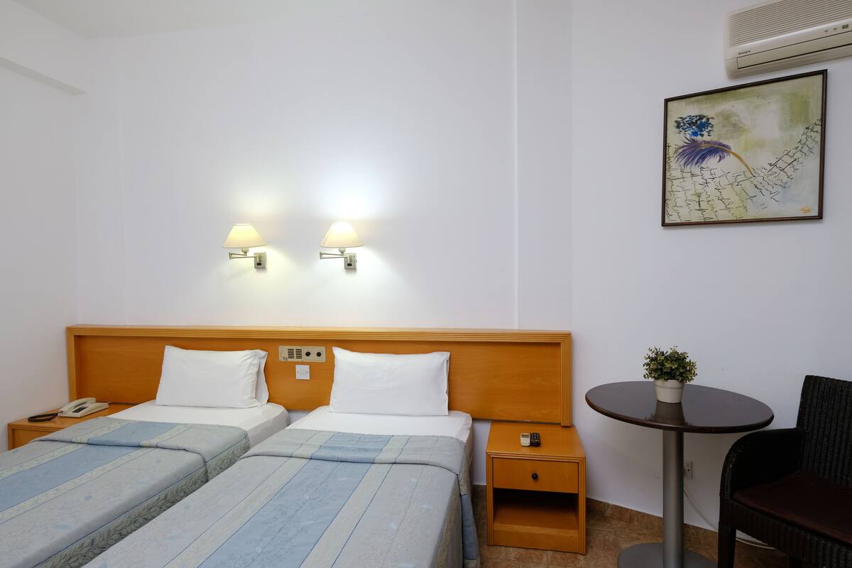 Desk, laptop workspace, blackout curtains, free WiFi