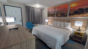 Chambre, 1 très grand lit, non-fumeur | Bureau, lit de bébé (gratuit), accès au Wi-Fi (inclus), literie fournie