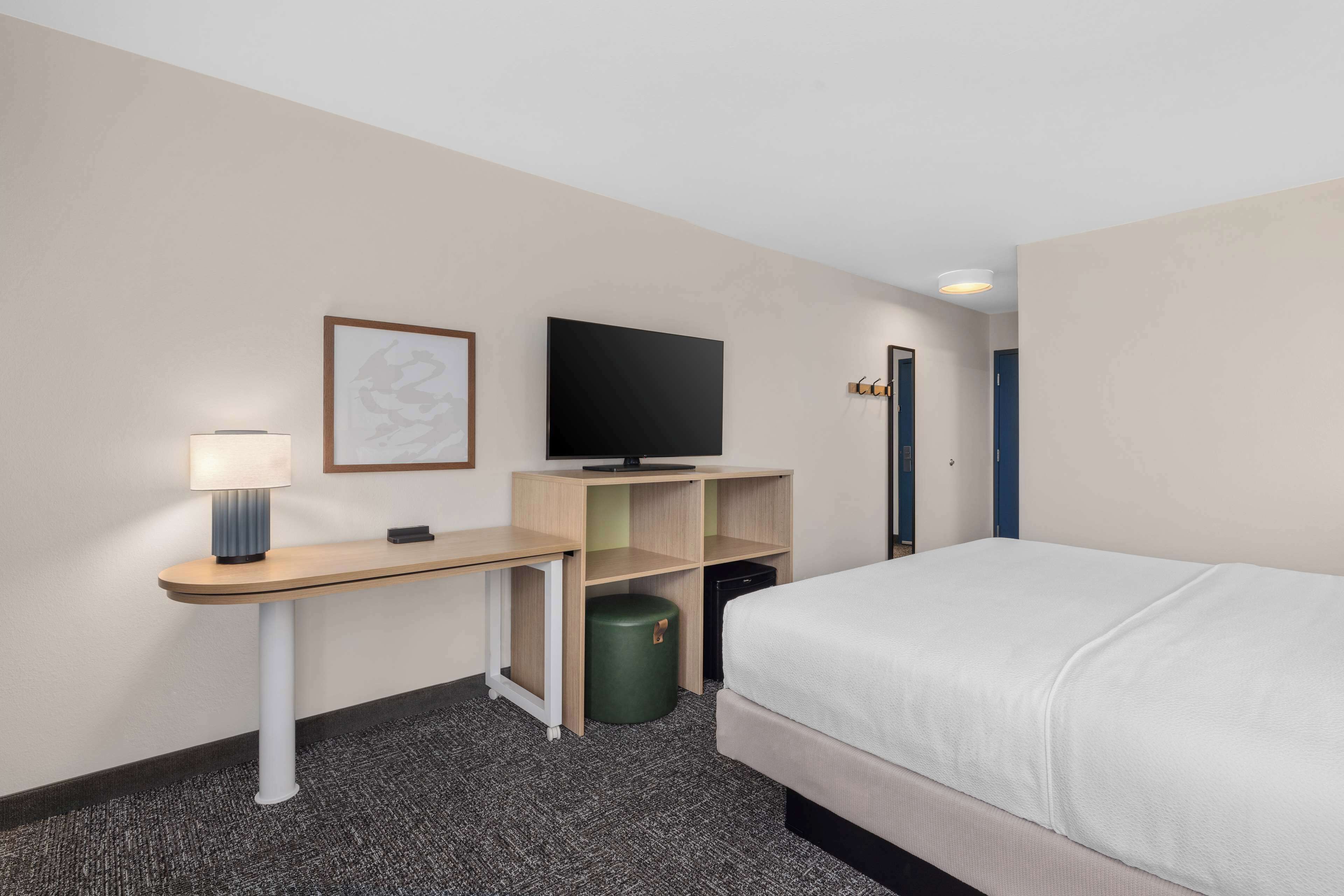 premium bedding, desk, blackout curtains, iron/ironing board