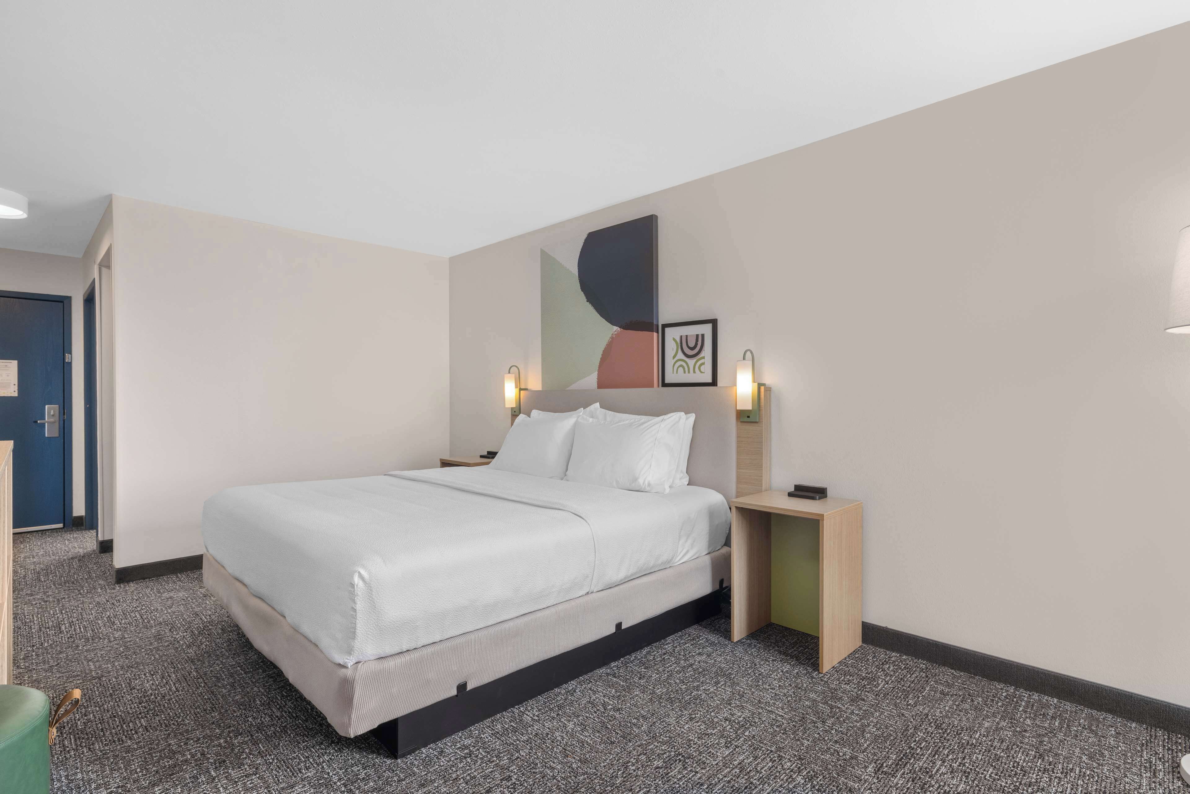 premium bedding, desk, blackout curtains, iron/ironing board