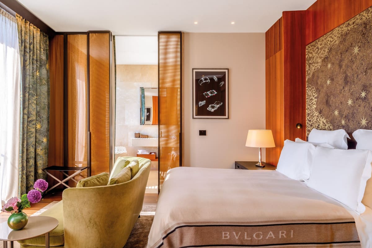 Suite estudio junior, 1 habitación, vista al jardín | Ropa de cama de alta calidad, edredón y minibar