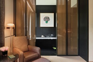 Separate tub and shower, rainfall showerhead, hair dryer, bathrobes