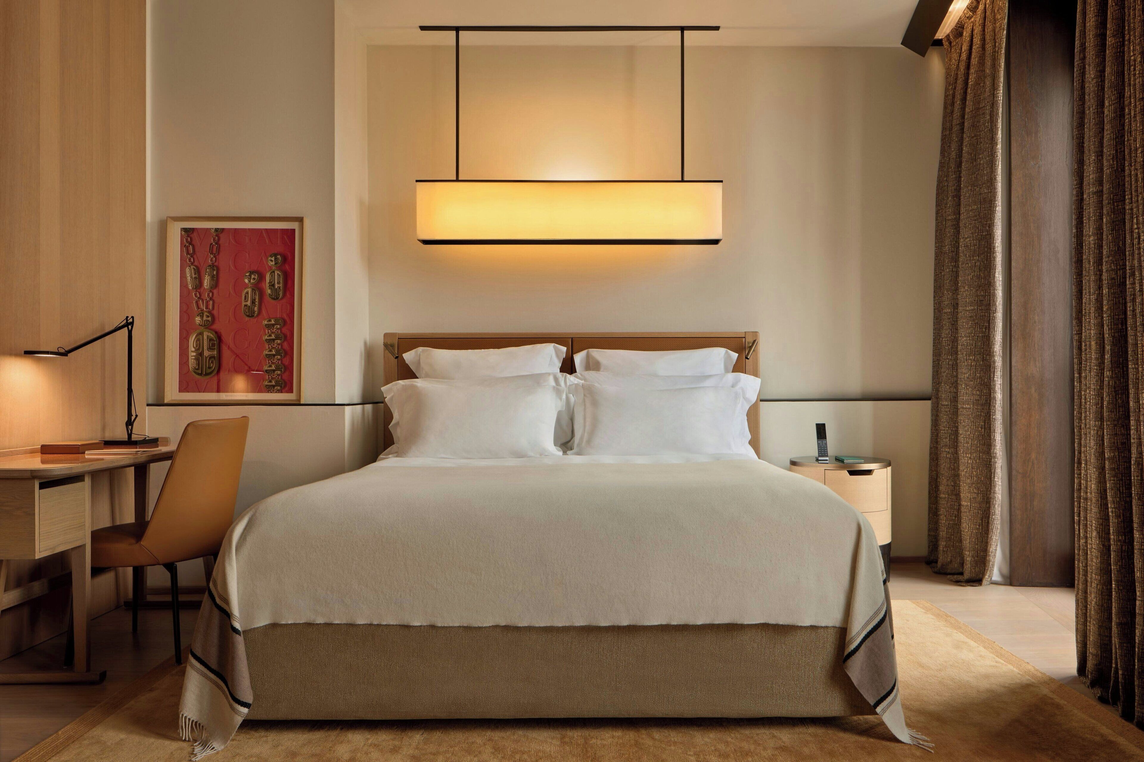 Kamar Superior, 1 Tempat Tidur King | Seprai premium, selimut bulu angsa, minibar, dan brankas