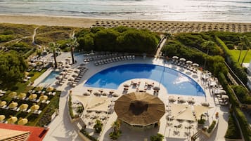 Indoor pool, outdoor pool, pool umbrellas, sun loungers