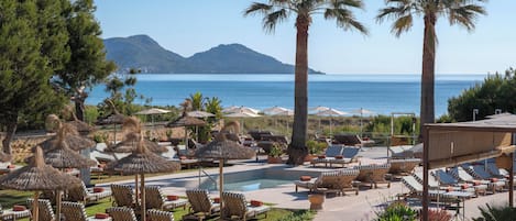 Indoor pool, outdoor pool, pool umbrellas, sun loungers