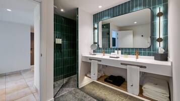 Shower, designer toiletries, hair dryer, bathrobes
