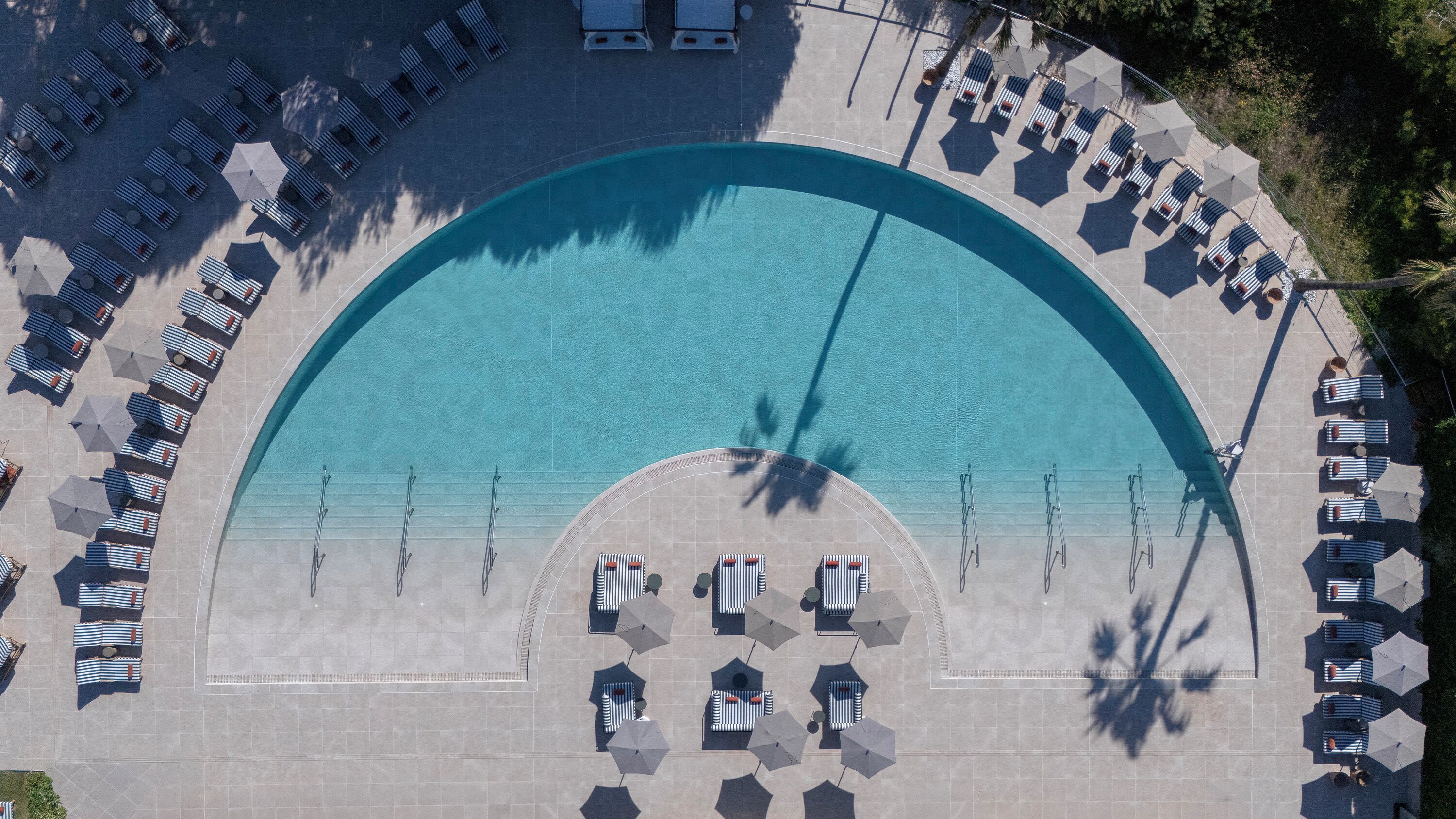 Indoor pool, outdoor pool, pool umbrellas, sun loungers