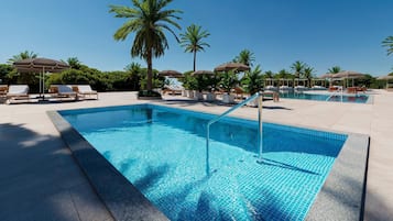 Indoor pool, outdoor pool, pool umbrellas, sun loungers