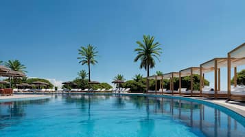Indoor pool, outdoor pool, pool umbrellas, pool loungers