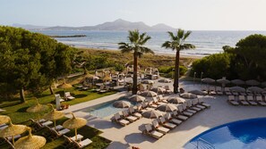 Indoor pool, outdoor pool, pool umbrellas, sun loungers - Sarena de Muro Resort Mallorca, part of Destination by Hyatt (Muro)