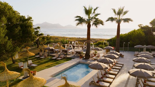 Indoor pool, outdoor pool, pool umbrellas, sun loungers