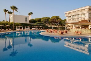 Indoor pool, outdoor pool, pool umbrellas, pool loungers