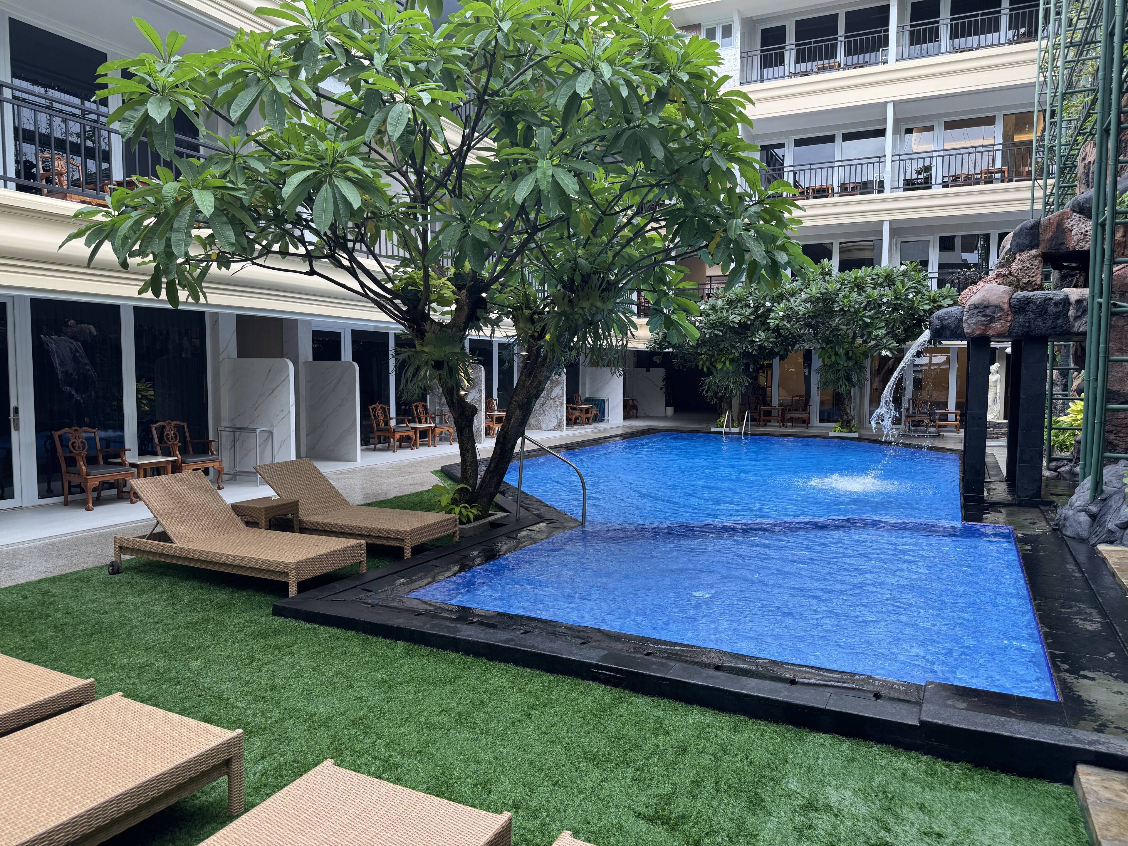 Outdoor pool, open 8:00 AM to 10:00 PM, pool umbrellas, sun loungers