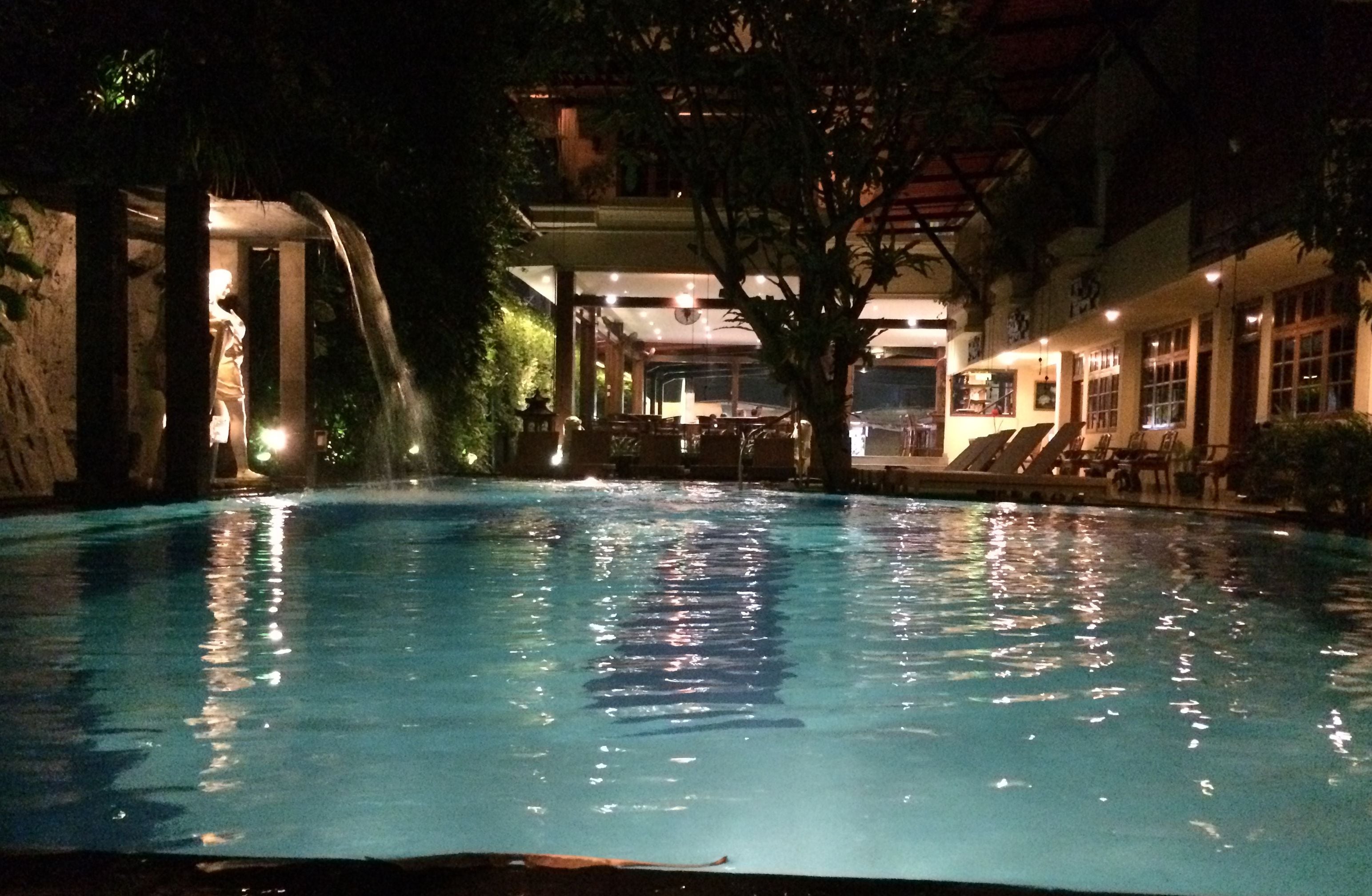 outdoor pool, open 8:00 am to 10:00 pm, pool umbrellas, pool loungers