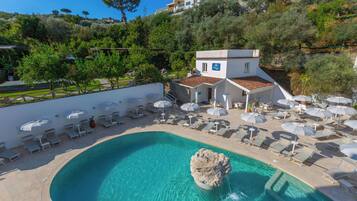 Seasonal outdoor pool, open 10 AM to 6 PM, pool umbrellas, sun loungers