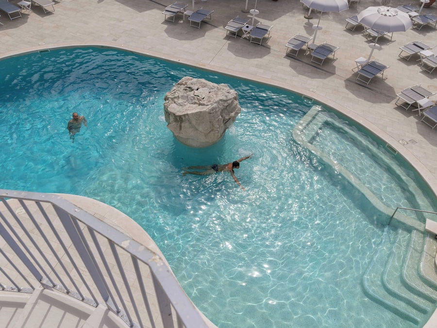 Seasonal outdoor pool, open 10 AM to 6 PM, pool umbrellas, pool loungers