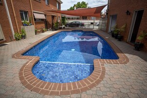 Outdoor pool, open 8:30 AM to 8:00 PM, pool umbrellas, sun loungers