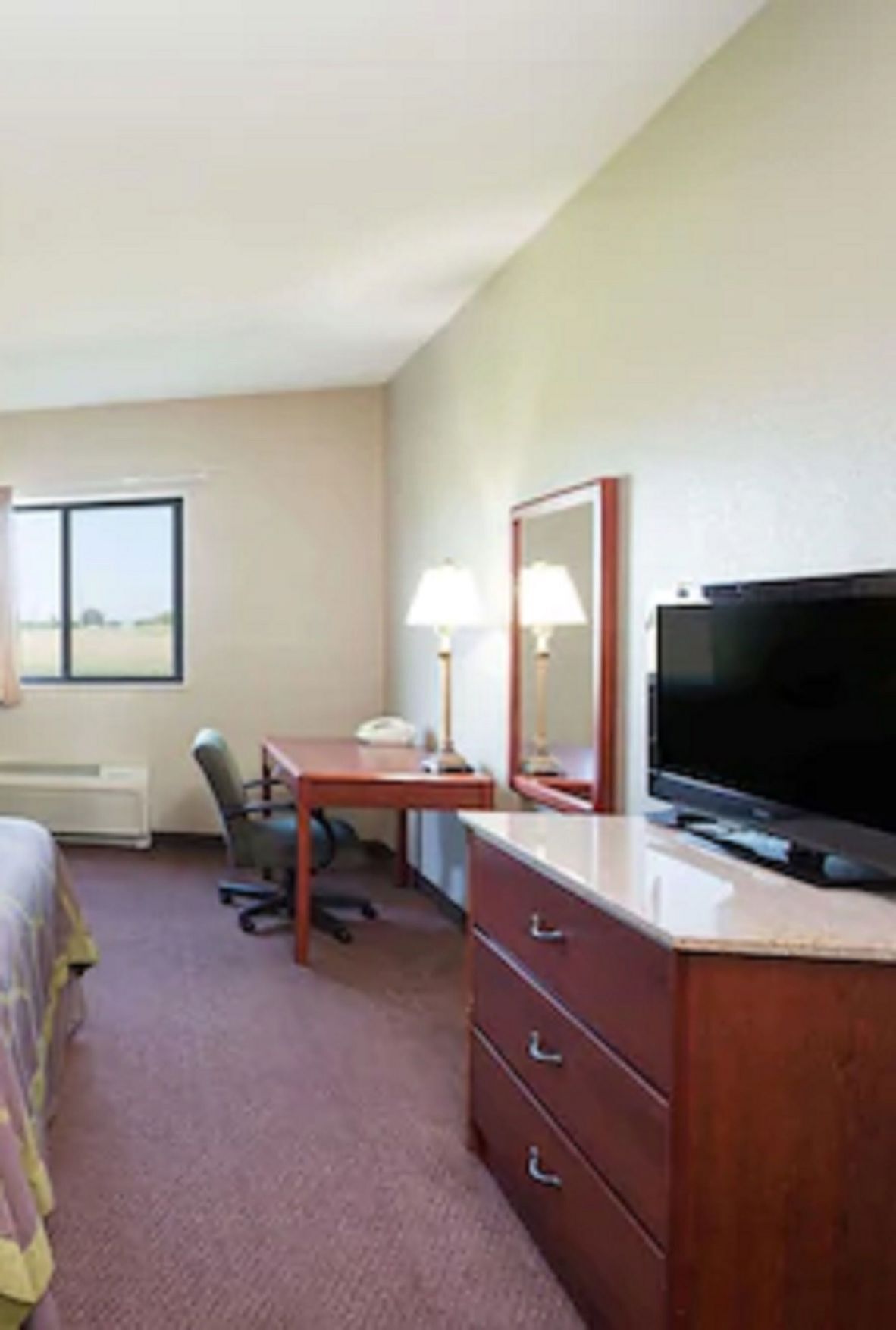 Desk, blackout curtains, iron/ironing board, free cots/infant beds