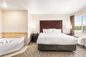 Suite, 1 King Bed with Sofa Sleeper, Whirlpool Tub, Non Smoking | Premium bedding, desk, laptop workspace, iron/ironing board - Boarders Inn & Suites by Cobblestone Hotels - Shawano (Shawano)