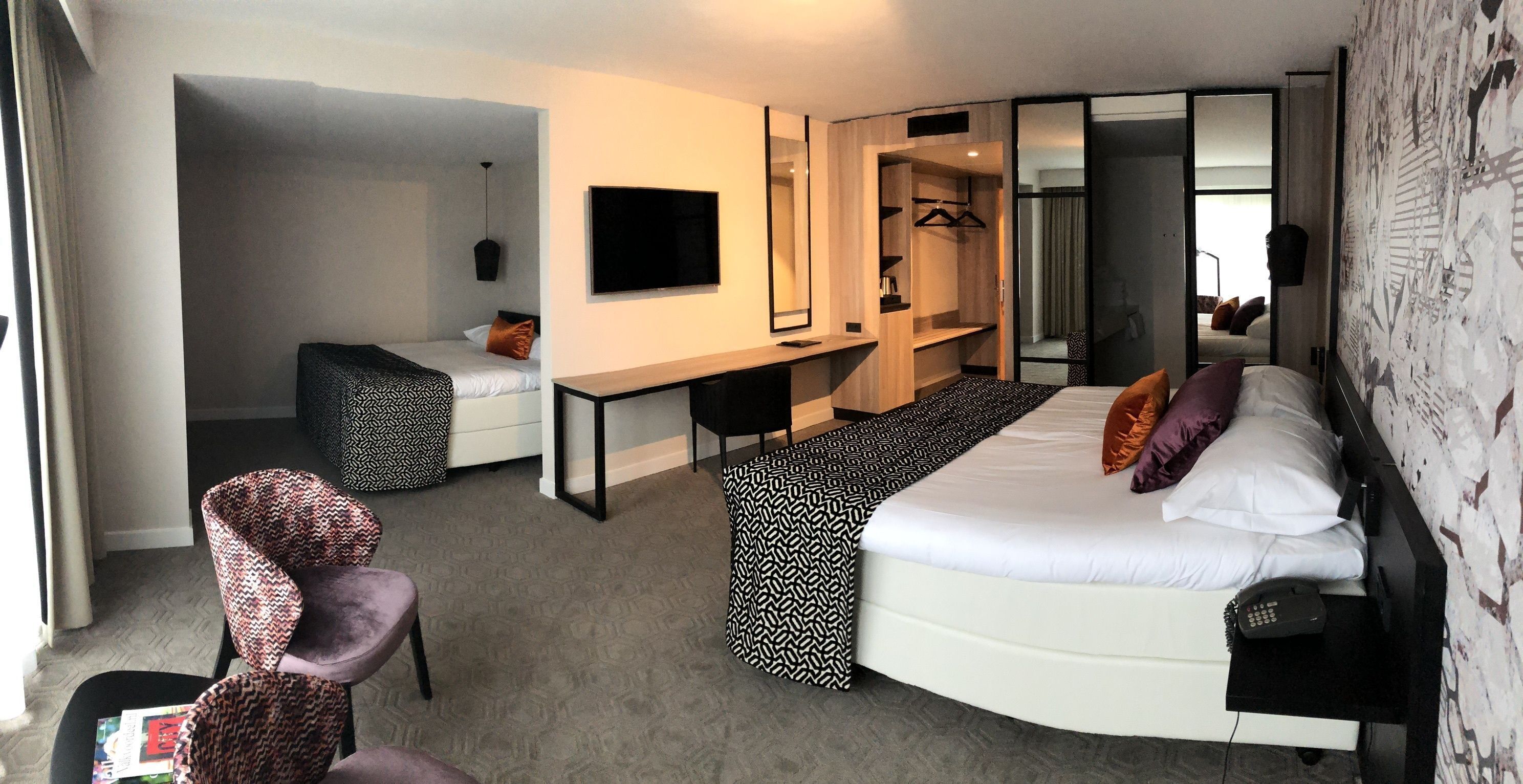 Luxe beddengoed, donsdekens, een minibar, een kluis op de kamer