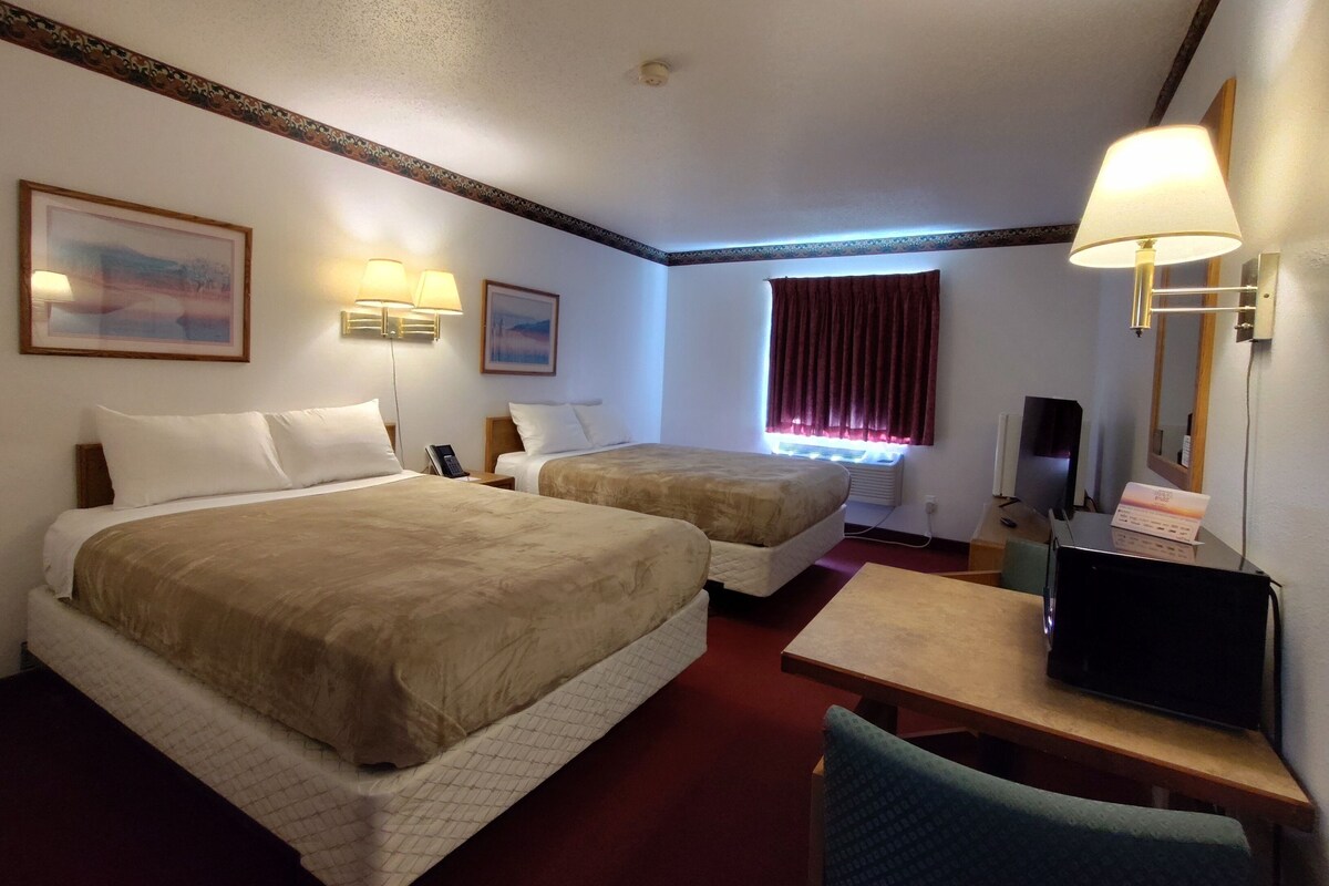 Room, 2 Queen Beds, Non Smoking | Living area | Flat-screen TV