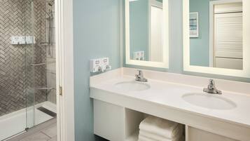 Shower, designer toiletries, hair dryer, towels