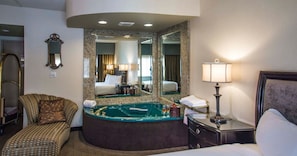 Executive Suite, 1 King Bed (Jetted Tub) | Premium bedding, in-room safe, desk, laptop workspace
