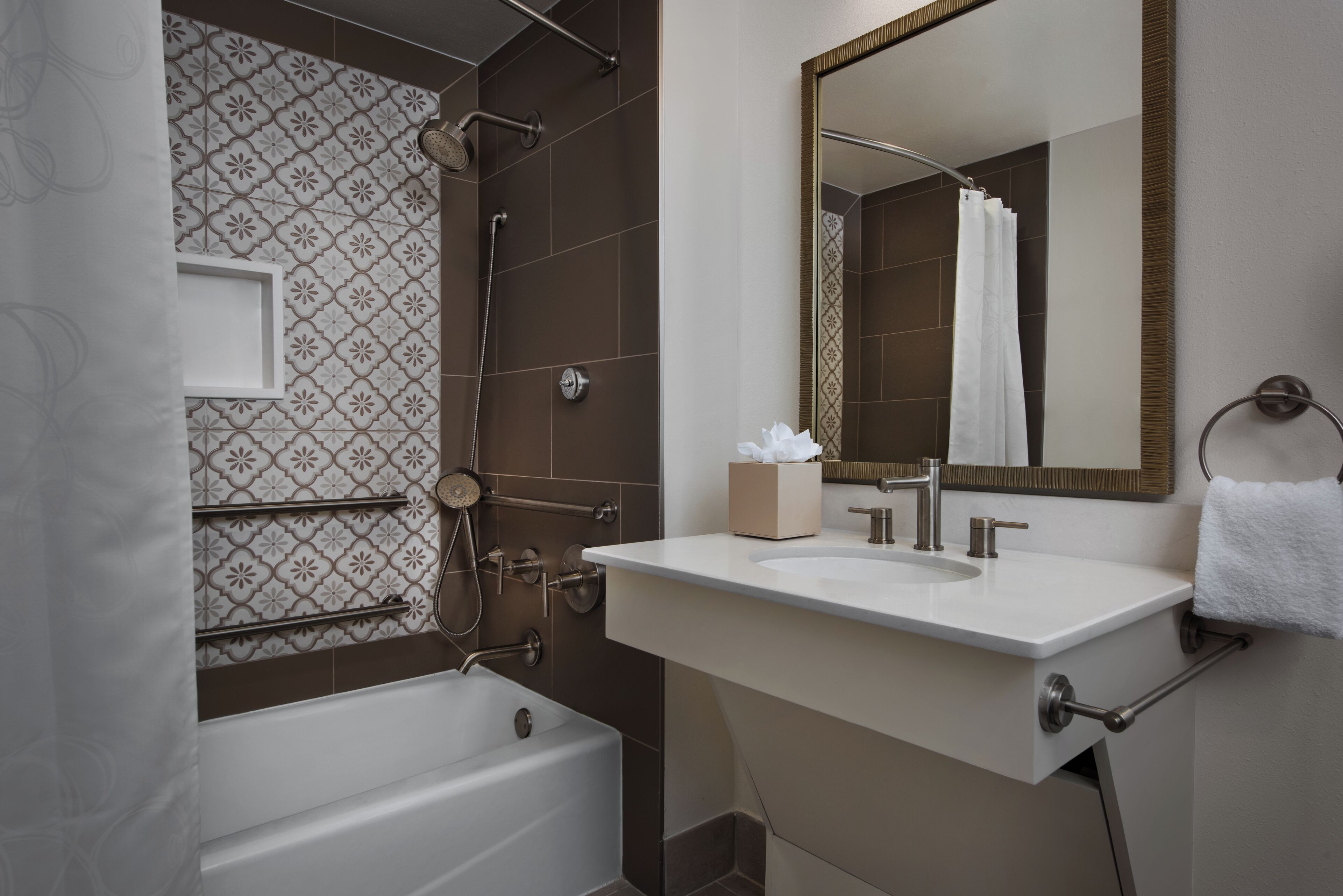 deluxe studio, 1 queen bed with sofa bed | bathroom | combined shower/bathtub, hair dryer, towels