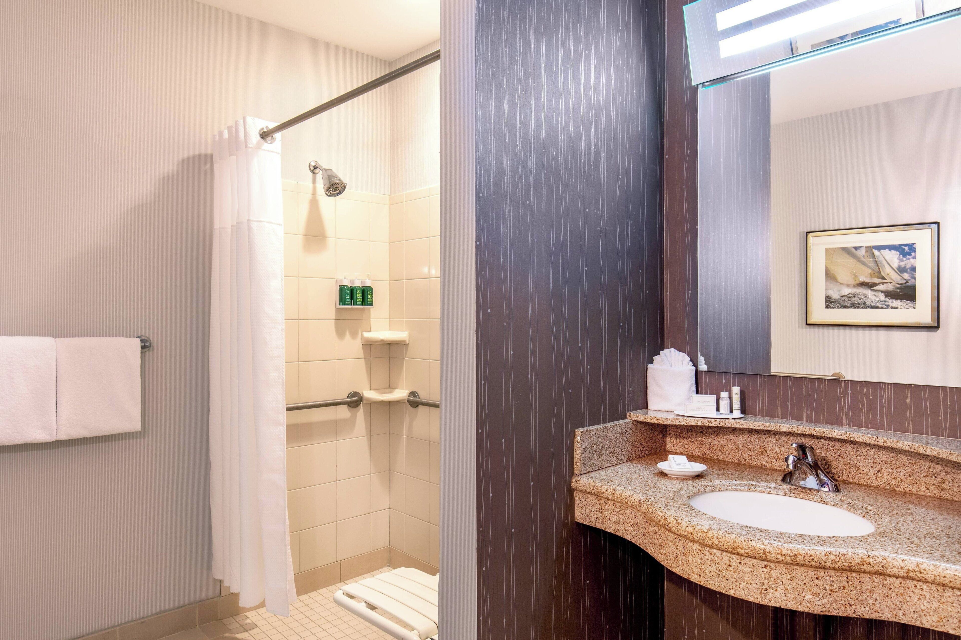 combined shower/bathtub, free toiletries, hair dryer, bathrobes