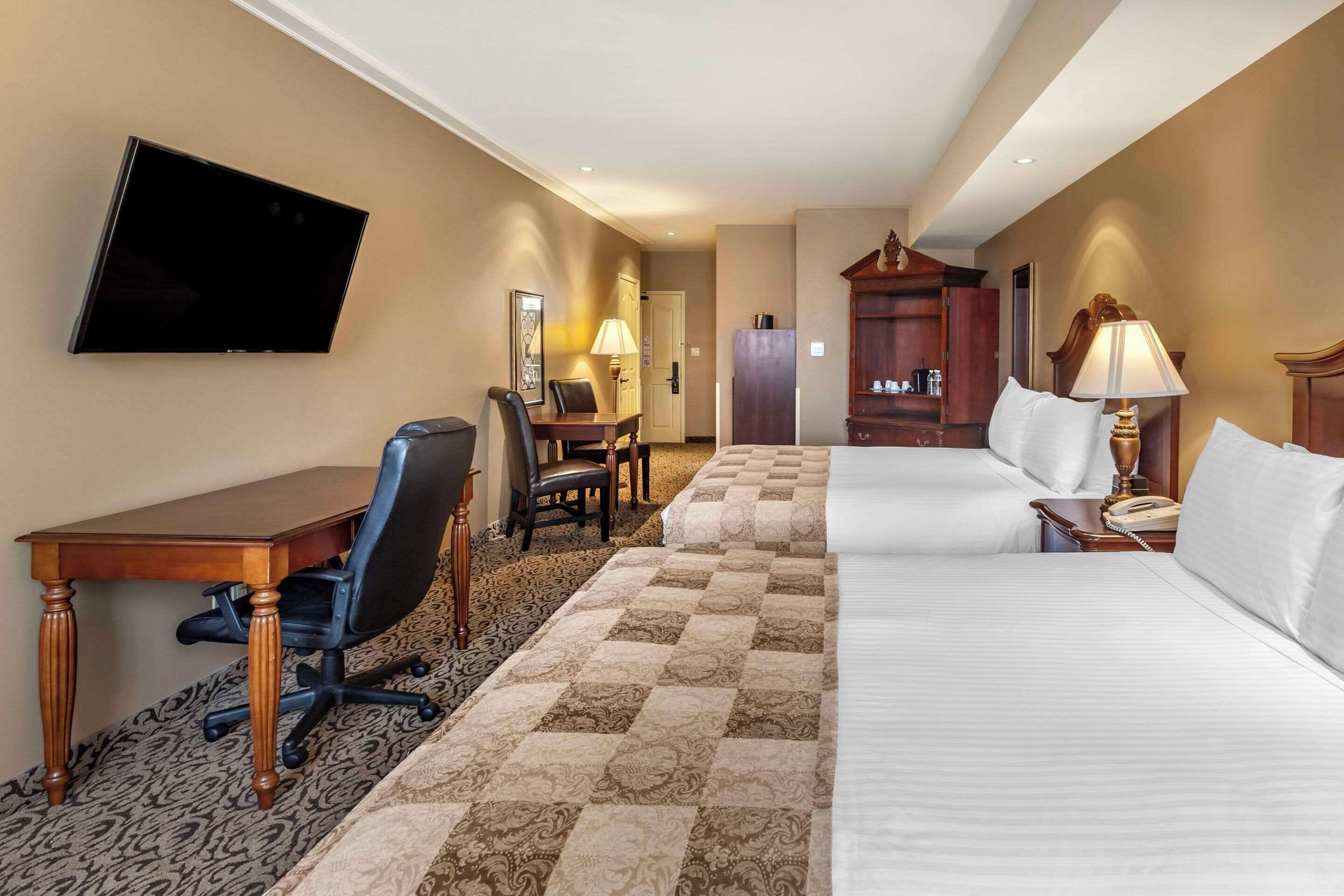 standard room, 2 queen beds, non smoking | desk, iron/ironing board, free wifi, bed sheets