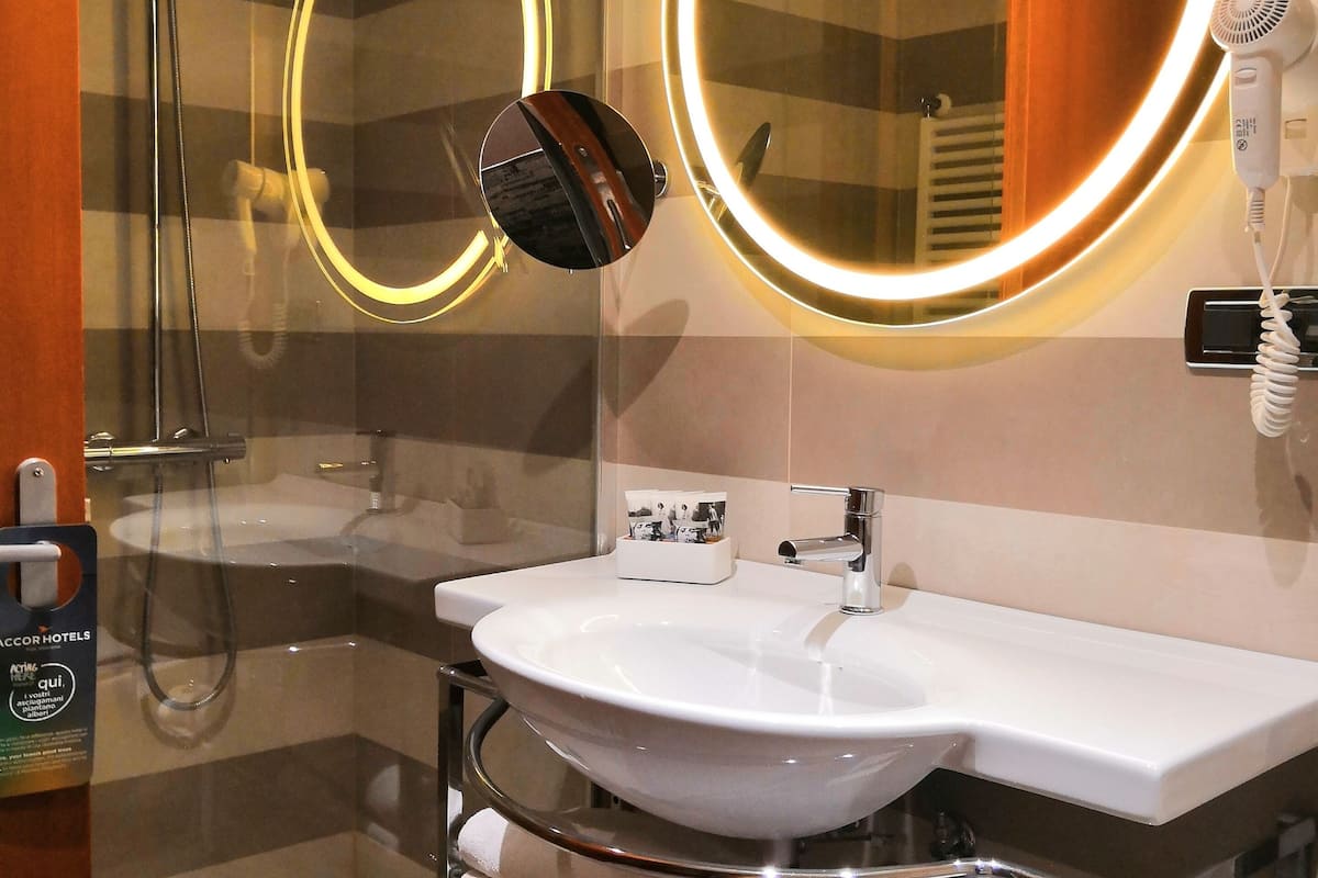 shower, eco-friendly toiletries, hair dryer, bidet