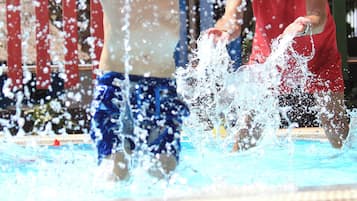 4 outdoor pools, open 9:00 AM to 6:00 PM, pool umbrellas, pool loungers