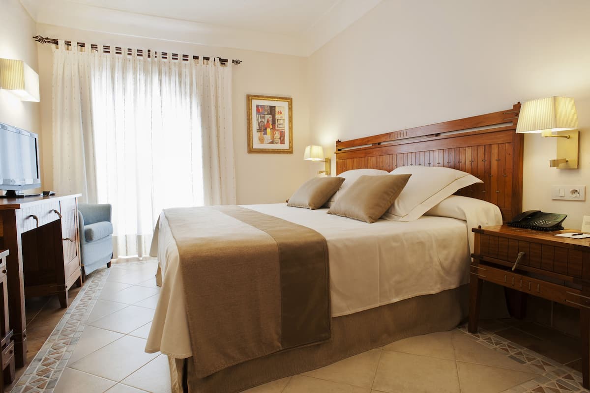 Ropa de cama de alta calidad y minibar