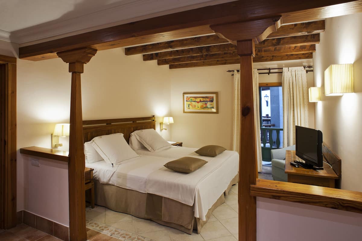 Ropa de cama de alta calidad y minibar