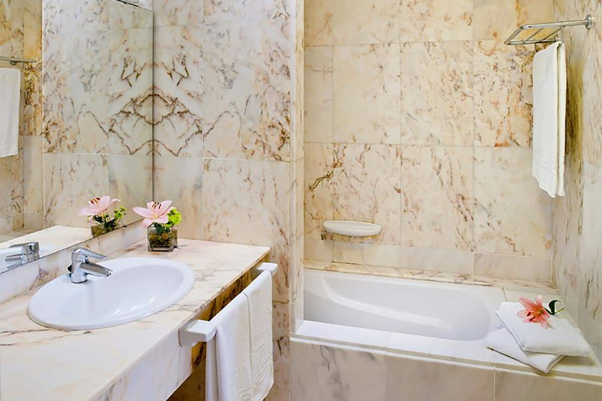 free toiletries, hair dryer, bidet, towels