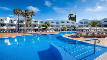Outdoor pool, pool umbrellas, sun loungers