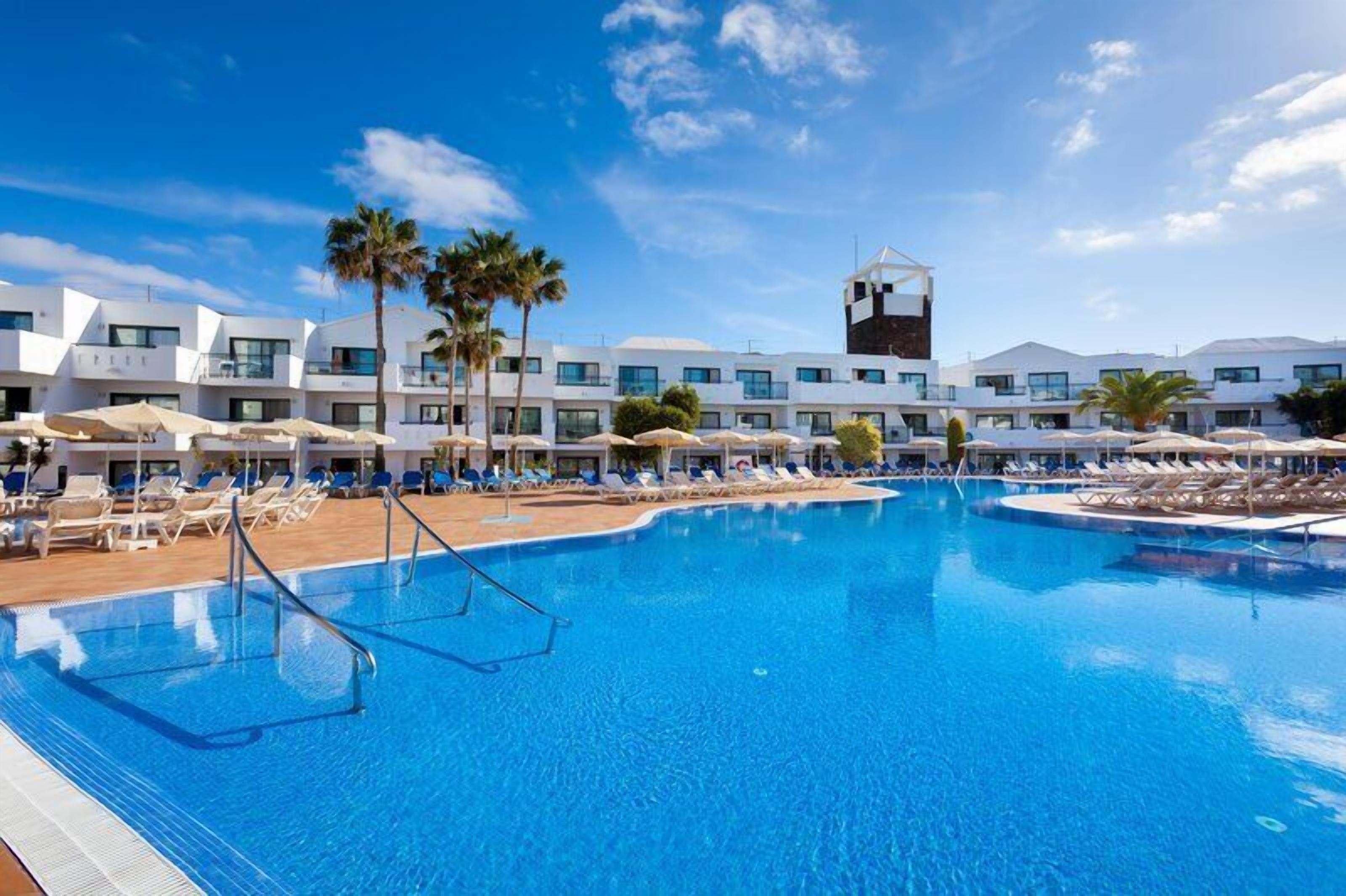 Outdoor pool, pool umbrellas, pool loungers