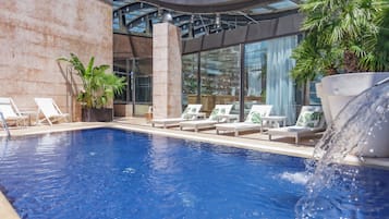 Seasonal outdoor pool, pool loungers