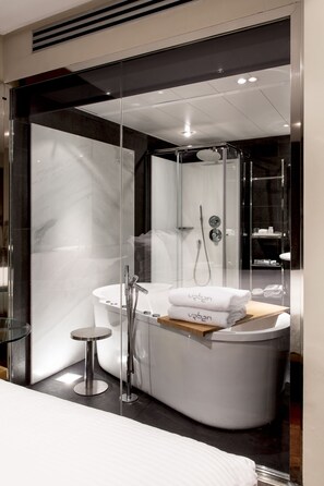 Premium bedding, free minibar items, in-room safe, desk