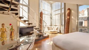 Loft | Luxe beddengoed, een minibar met enkele gratis items