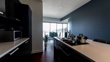 Penthouse, 3 Bedrooms | Private kitchen | Full-sized fridge, microwave, dishwasher, electric kettle