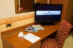 Premium bedding, pillow-top beds, free minibar, in-room safe