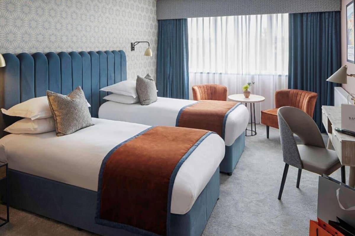 Hypo-allergenic bedding, in-room safe, desk, laptop workspace