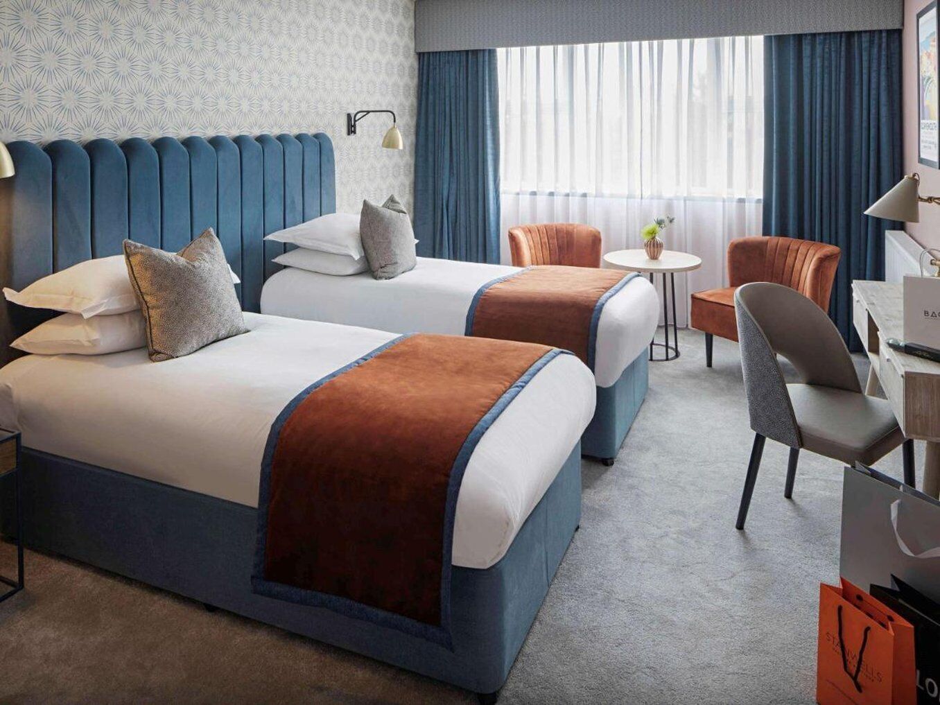 Hypo-allergenic bedding, in-room safe, desk, laptop workspace